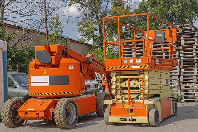 industrial forklift transporting goods in a warehouse setting in Berry Creek